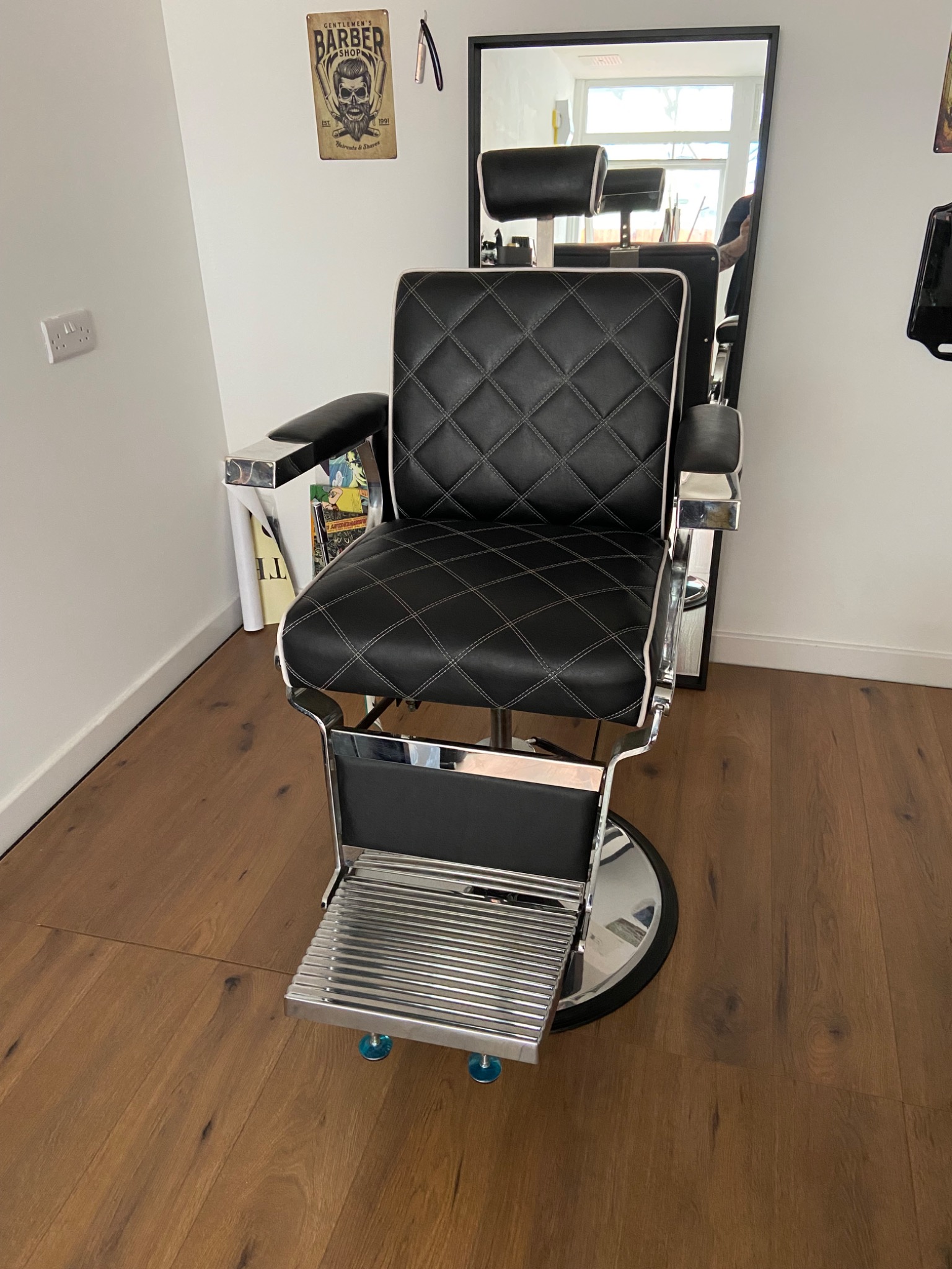 Barber chair inside The Velvet Blade Barbershop
